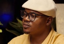 Why Are You In University? Kel A. Amobi